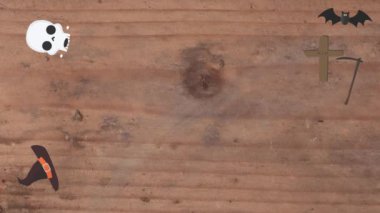 Ahşap doku ekranında Cadılar Bayramı elementleri tasarımı olan hareketli grafikler