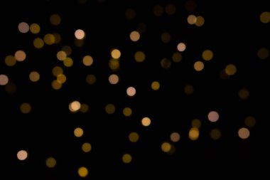 Soyut, sarı, soyut, bulanık bokeh ışıkları, şenlikli bir arkaplan için bulanık. Fotoğraf.