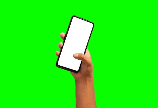 Рука Взаимодействует Мобильным Телефоном Белым Экраном Зеленом Фоне — стоковое фото