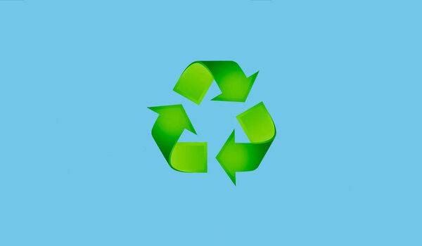 high resolution green recycling sign on blue background