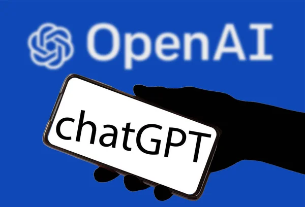ChatGPT chatbot with artificial intelligence with a hand showing a cell phone with a white screen with the word chatgtp