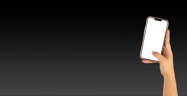 Красивая Рука Женщины Держащей Сотовый Телефон Черным Фоном Поблекла Белого — стоковое фото