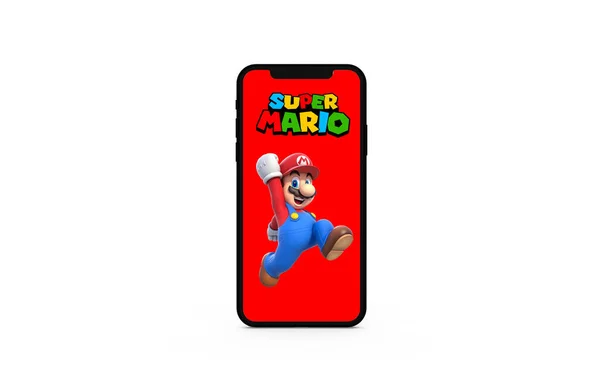 スーパーマリオブラザーズは 白い背景を持つ携帯電話上の元のロゴと赤の背景にジャンプ — ストック写真