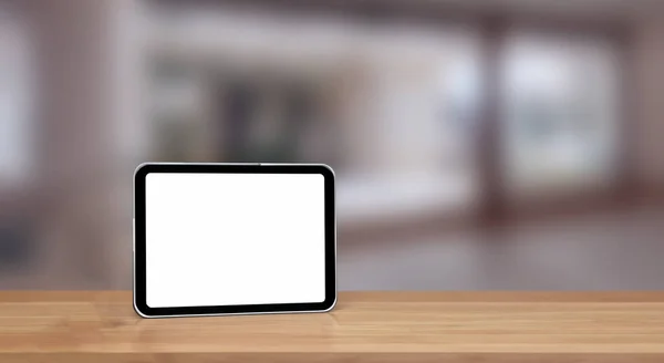 漂亮的新平板电脑 白色屏幕放在木制桌子上 房间背景分散 — 图库照片