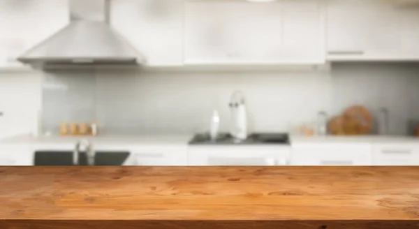 beautiful clean tidy kitchen defocused with a table to place things