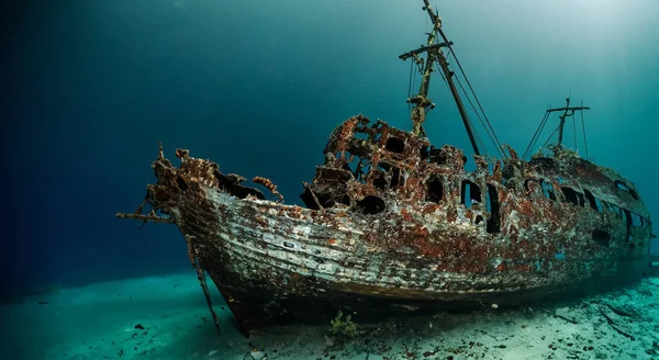 amazing sunken ship in the middle of the sea with good lighting