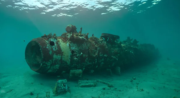sunken submarine under the deep sea with good lighting