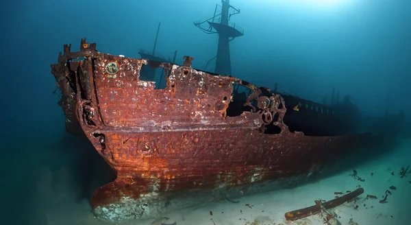amazing rusty sunken ship under the sea in the depths with good lighting HD