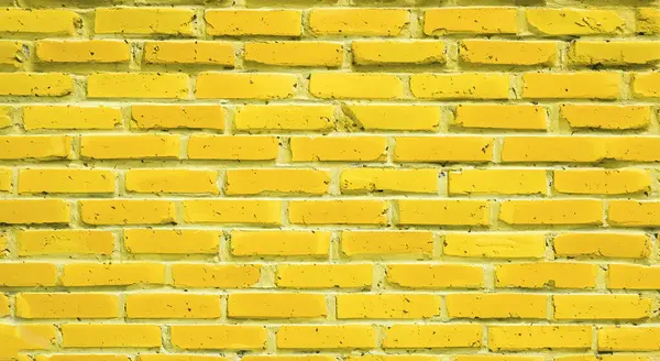 具体的な壁の背景 白いHdが付いている黄色い色のパターン板のセメントの質 — ストック写真