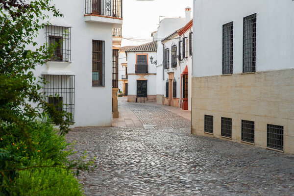 Typical street in the city of Ronda, Malaga, Andalusia, Spain.