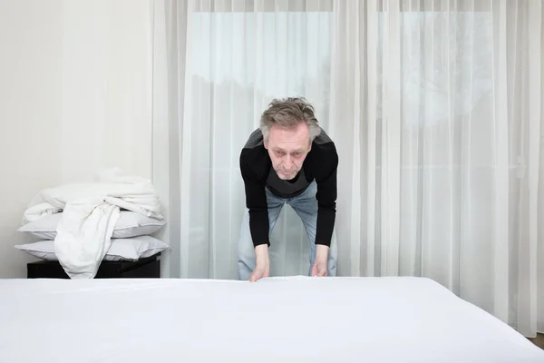 Older Man Working Bedroom Making Bed — Stock Photo, Image