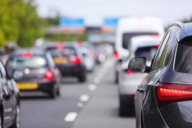 Traffic jam congestion with rows of cars on highway or motorway in rush hour after accident clipart