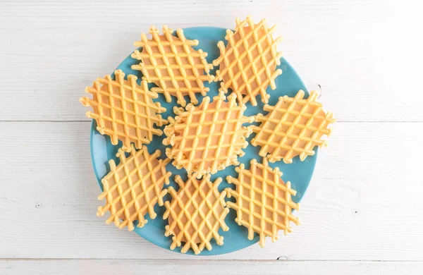Ferratelle Pizzelle Traditional Dessert Cookies Blue Plate White Wooden Background — Stock Photo, Image