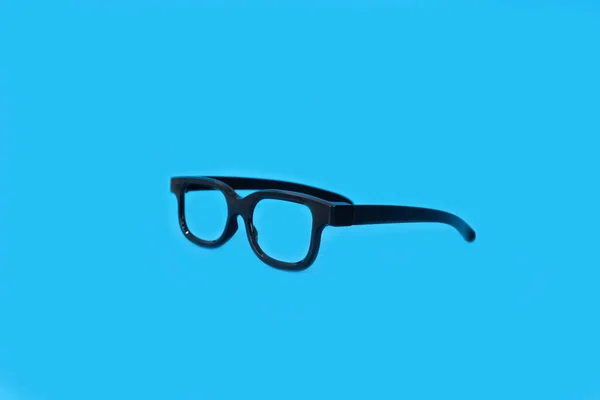 Gafas Sobre Fondo Azul Brillante Foto Alta Calidad —  Fotos de Stock