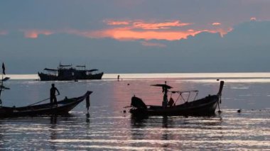 Spectacular sunset with boats in the sea, Koh Tao, Thailand