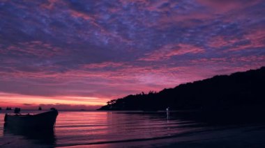 Spectacular sunset with boats in the sea, Koh Tao, Thailand