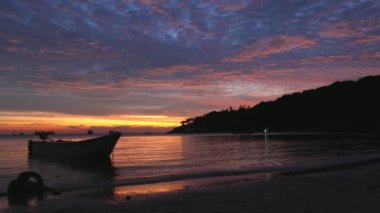 Spectacular sunset with boats in the sea, Koh Tao, Thailand