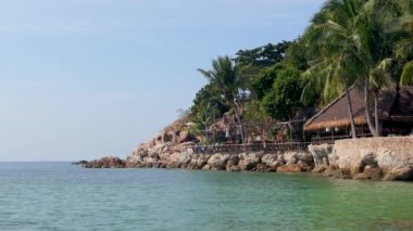 Tropical paradise sandy beach at Koh Tao island, Koh Samui, Thailand. Beach Holiday in Thailand. Tropical Thai beach on sunny day.
