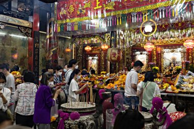 Chinese temple people praying in Chinatown Bangkok