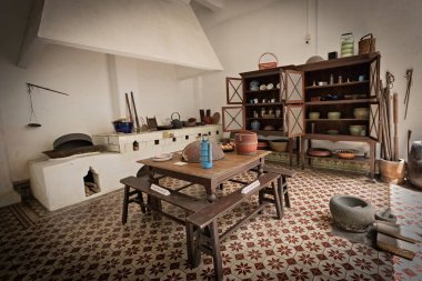 Old kitchen utensils in the Baba and Nyonya heritage museum in Melaka Malaysia
