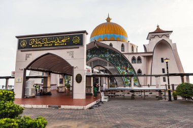 Melaka Straits Mosque Masjid Selat Melaka at sunset light Melaka Malaysia