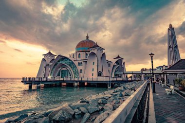Melaka Straits Mosque Masjid Selat Melaka at sunset light Melaka Malaysia