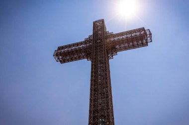 Millenium cross view against blue sky in Skopje North Macedonia clipart