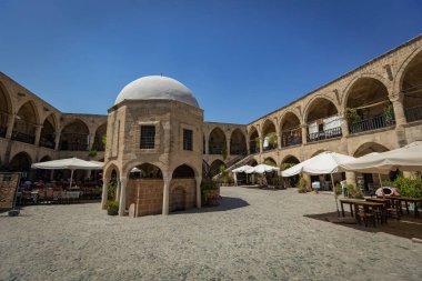 Traditional Turkish caravanserai in Nicosia Northern Cyprus converted into the souvenirs market and coffee 