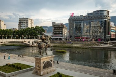 Skopje cityscape by the river Vardar North Macedonia clipart