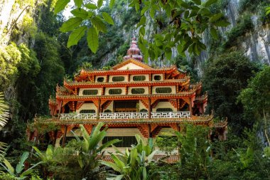 Spectacular view of Sam Poh Tong temple hidden in the mountains in Ipoh, Malaysia clipart