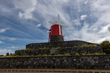 Traditional windmills on Pico island Azores Portugal clipart