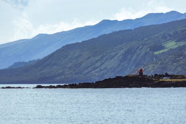 Traditional windmills on Pico island Azores Portugal clipart