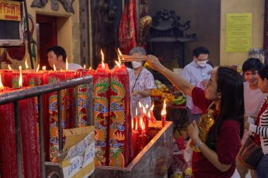Traditional candles for Chinese new year celebration in Mangkon temple in Bangkok Thailand.