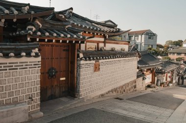 Traditional Korean architecture old houses and street view at Bukchon Hanok Village Seoul South Korea clipart