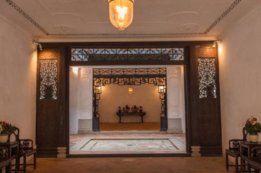 Mandarin 'in Macau' daki evinde iç dekorasyon ve eski mobilyalar.