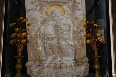 Macau 'daki Templo de Kun Iam Tong' da Marbel Buddha resmi.