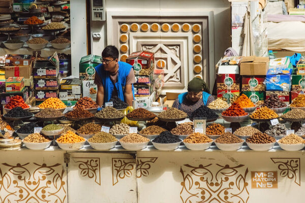  DUSHANBE, TAJIKISTAN - August 20, 2025: Traditional market Mehrgon Market dry fruits and nuts for sale on the Central Asian bazaar in Dushanbe