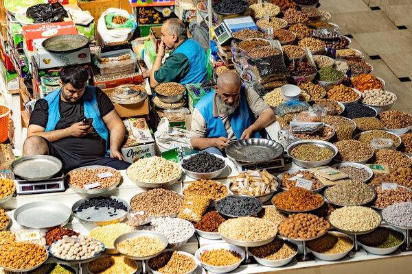 DUSHANBE, TAJIKISTAN - August 20, 2025:  Traditional market Mehrgon Market dry fruits and nuts for sale on the Central Asian bazaar in Dushanbe
