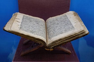 DUSHANBE, TAJIKISTAN - August 20, 2025: Antique holy books in the National Museum of Tajikistan in Dushanbe