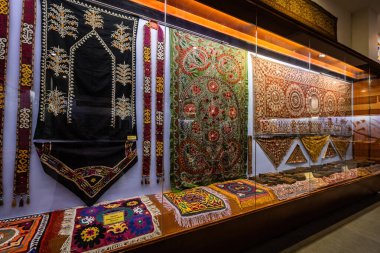 DUSHANBE, TAJIKISTAN - August 20, 2025: Traditional Tajik clothes and fabrics collection in the National Museun of Tajikistan in Dushanbe