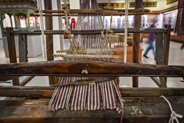 DUSHANBE, TAJIKISTAN - August 20, 2025: Antique weaving loom in the National Museum of Tajikistan, Dushanbe 