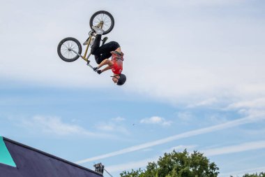 Munich, Germany - Aug 11, 2022: Riders compete at the BMX Freestyle European Championsships at Olympiapark in Munich, Germany. Men's qualifiacation