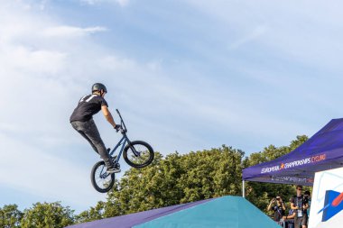 Munich, Germany - Aug 11, 2022: Riders compete at the BMX Freestyle European Championsships at Olympiapark in Munich, Germany. Men's qualifiacation