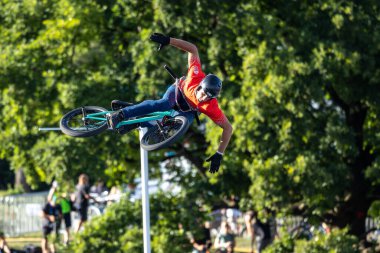 Munich, Germany - Aug 11, 2022: Riders compete at the BMX Freestyle European Championsships at Olympiapark in Munich, Germany. Men's qualifiacation