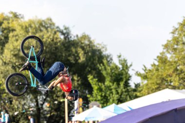 Munich, Germany - Aug 11, 2022: Riders compete at the BMX Freestyle European Championsships at Olympiapark in Munich, Germany. Men's qualifiacation