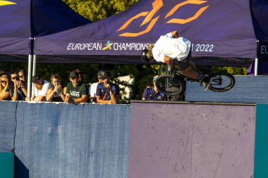 Munich, Germany - Aug 11, 2022: Riders compete at the BMX Freestyle European Championsships at Olympiapark in Munich, Germany. Men's qualifiacation