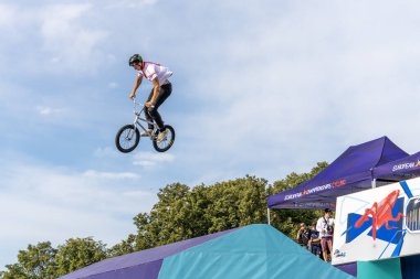 Munich, Germany - Aug 11, 2022: Riders compete at the BMX Freestyle European Championsships at Olympiapark in Munich, Germany. Men's qualifiacation