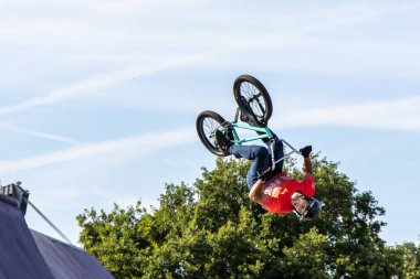 Munich, Germany - Aug 11, 2022: Riders compete at the BMX Freestyle European Championsships at Olympiapark in Munich, Germany. Men's qualifiacation