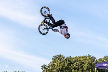 Munich, Germany - Aug 11, 2022: Riders compete at the BMX Freestyle European Championsships at Olympiapark in Munich, Germany. Men's qualifiacation