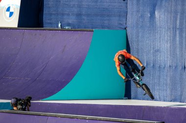 Munich, Germany - Aug 11, 2022: Riders compete at the BMX Freestyle European Championsships at Olympiapark in Munich, Germany. Men's qualifiacation